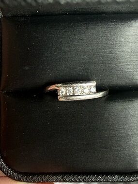 10k White Gold and 1/8 carat natural diamond ring size 7